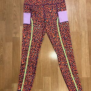 Peloton  Brittany Allen Orange and Purple Leopard Print Leggings, Like New